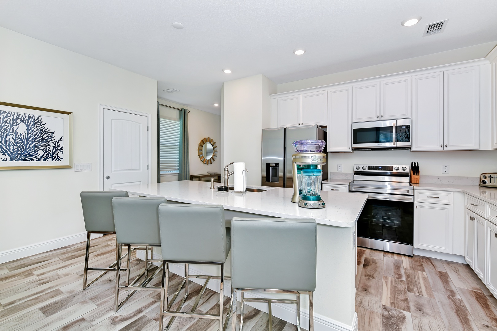 Sip morning coffee or grab a bite at the kitchen counter, with seating for 4