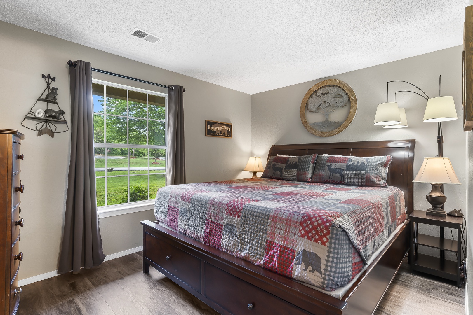 The bedroom retreat offers a plush king bed, ensuite bath, & Smart TV