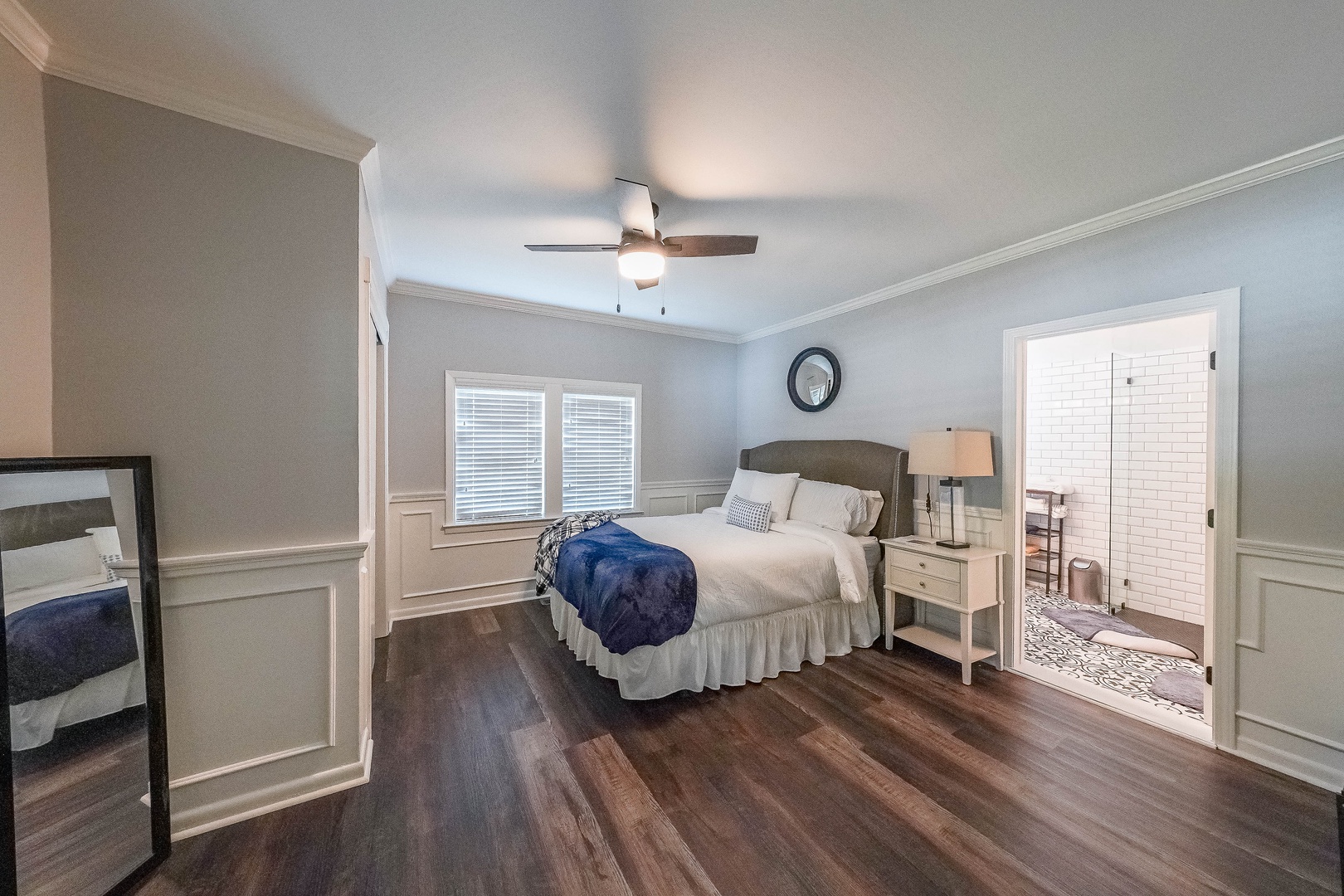 Bedroom 1 with queen bed, Smart TV, and ensuite