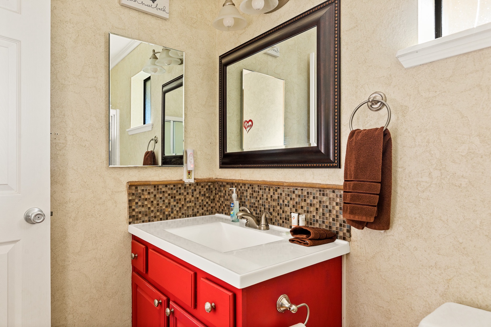 A second full bath includes a single vanity & shower/tub combo