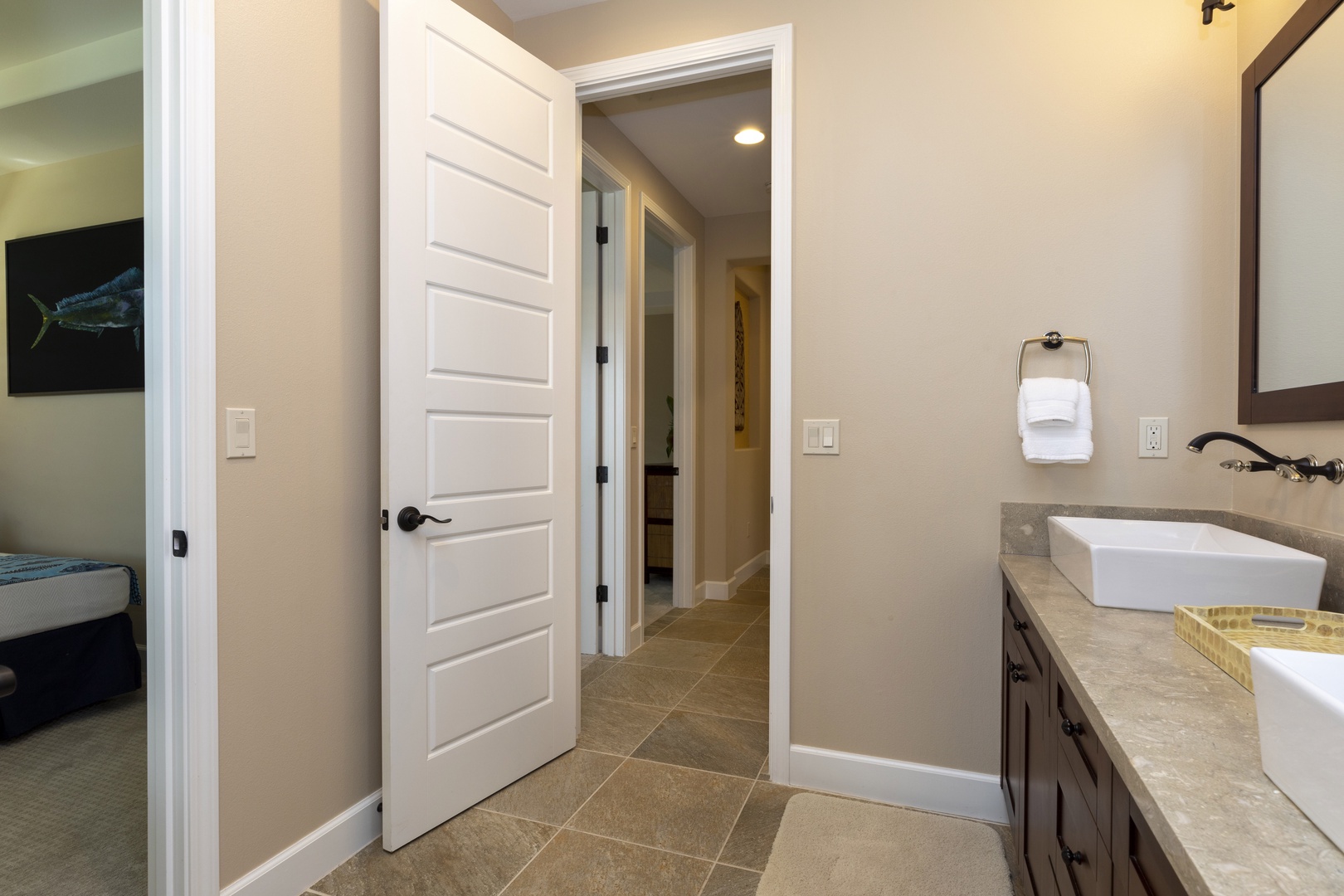 Shared bathroom attached to bedroom 1 with shower tub combo