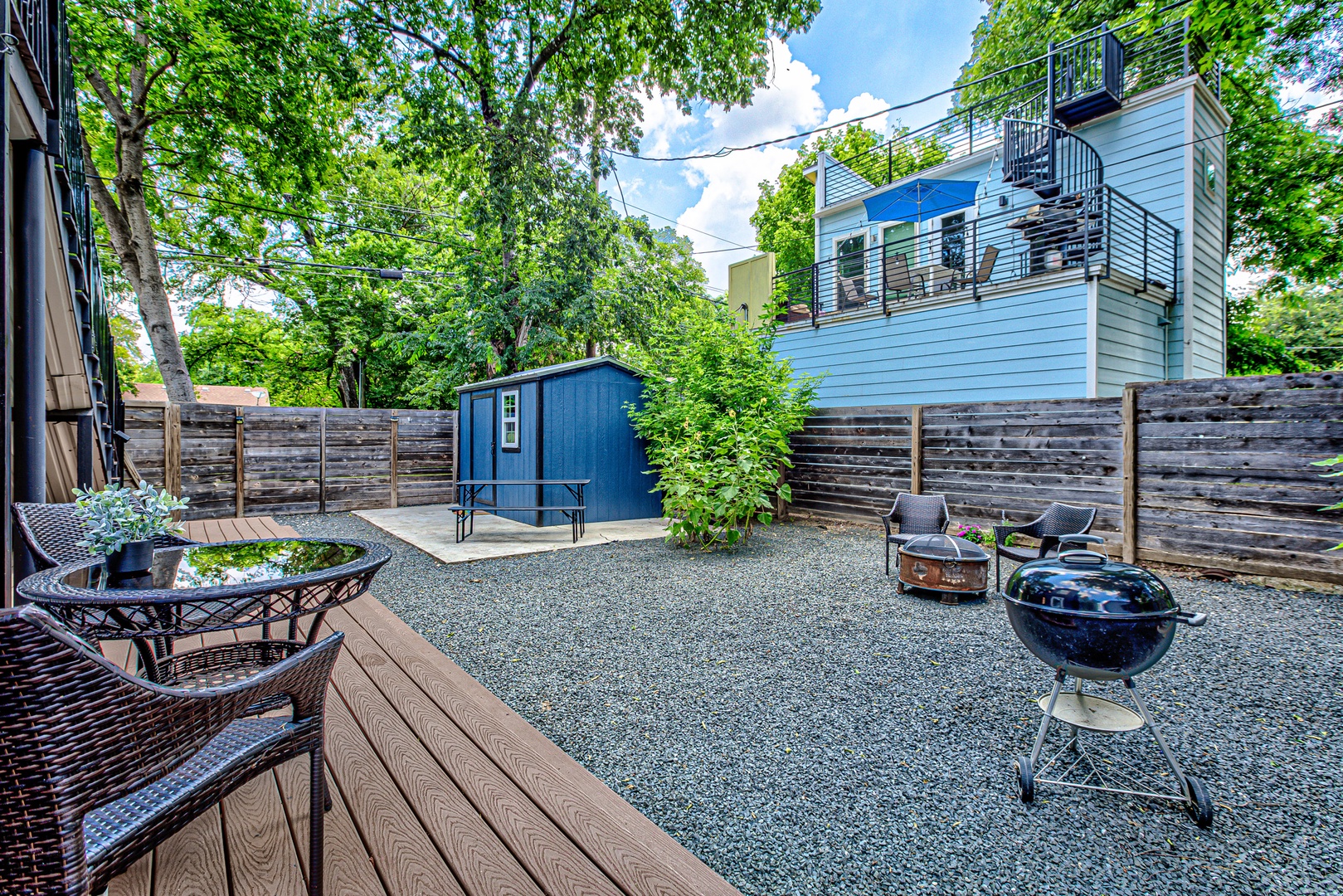 Exterior with fire pit and patio table