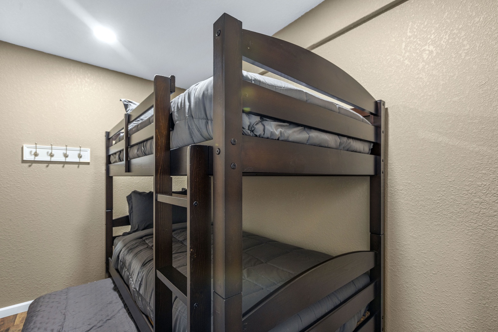 This bunk room includes twin-over-twin bunks & a twin trundle