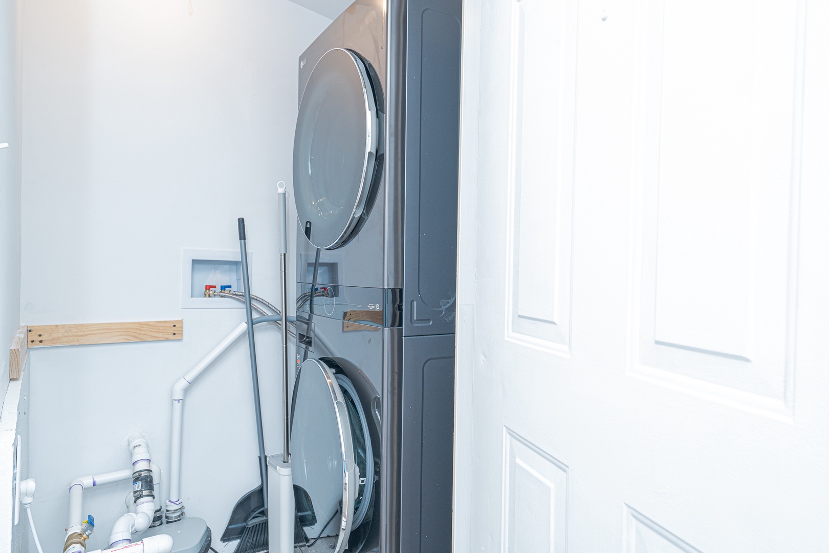 Private laundry is available for your stay, tucked away in a convenient closet