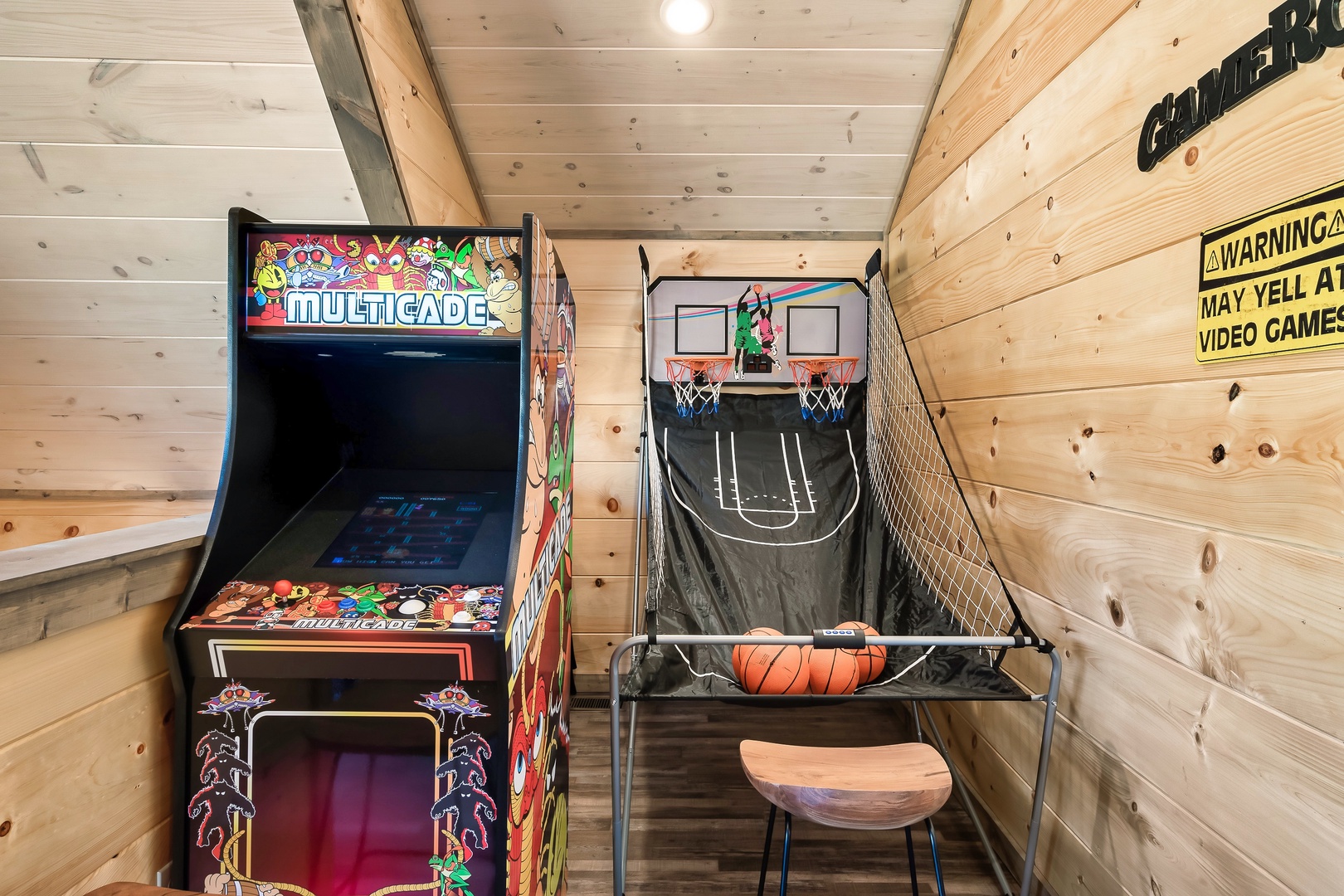 2nd floor landing game room with air hockey and arcade games