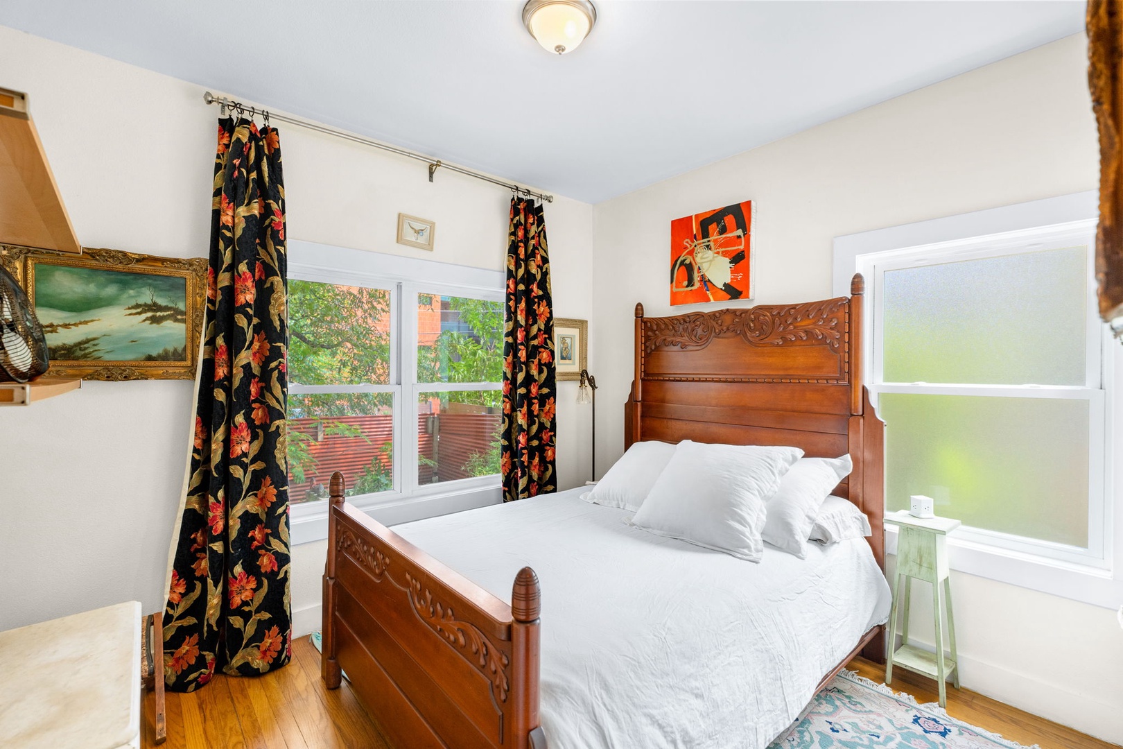 The 1st floor bedroom offers a regal full-sized bed & lots of natural light