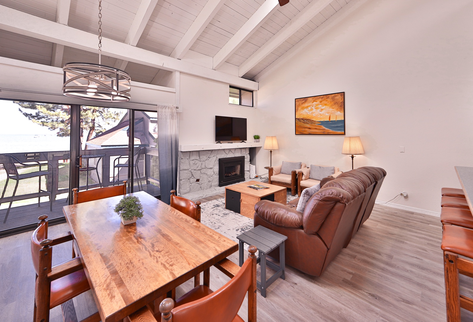 Living room with comfy seating, Smart TV, and fireplace