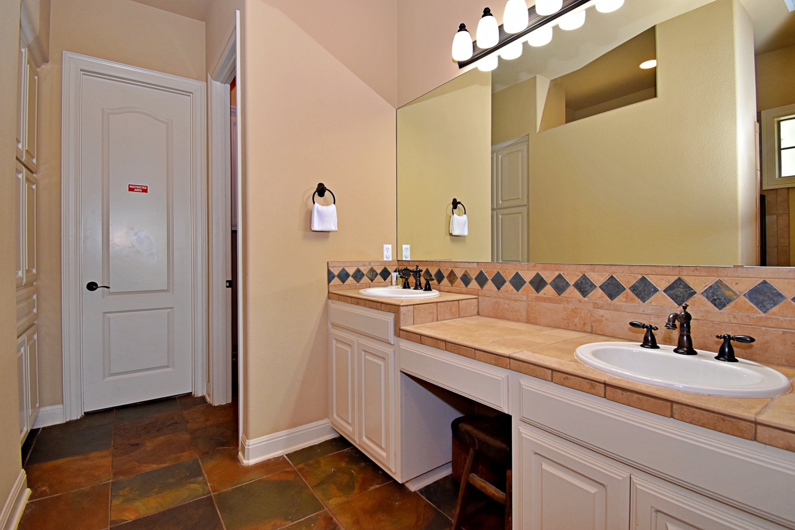 Bathroom 2 private en-suite with double vanity, and walk-in shower (1st floor)