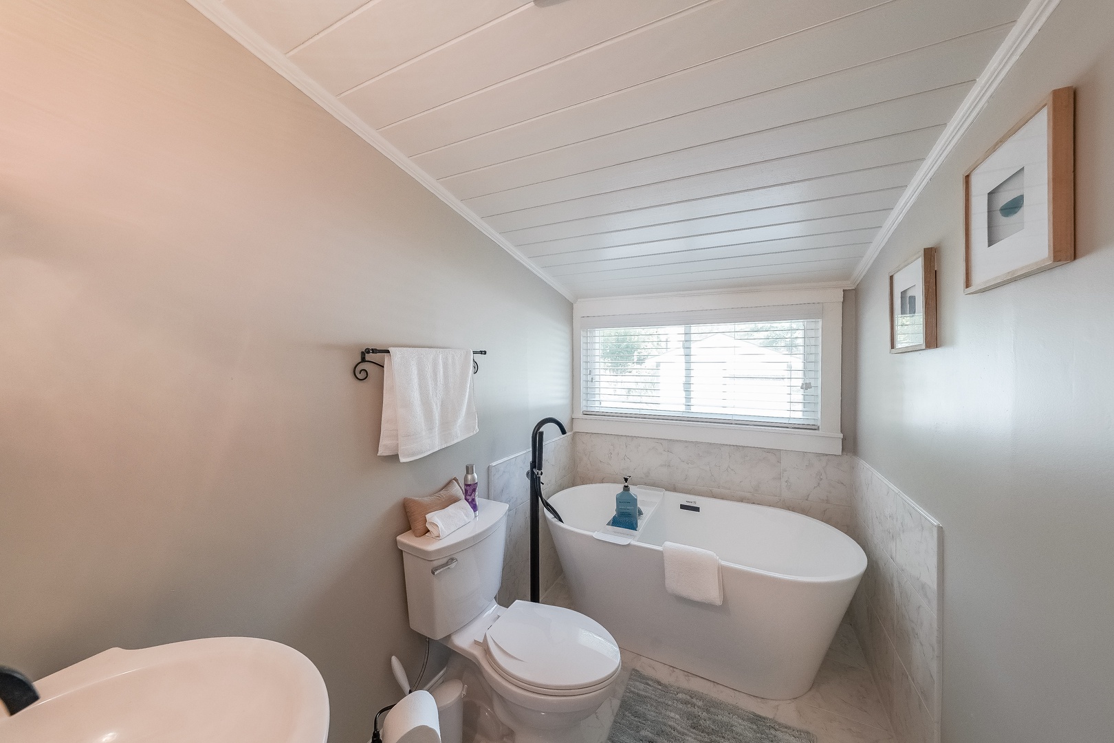 Shared bathroom with tub