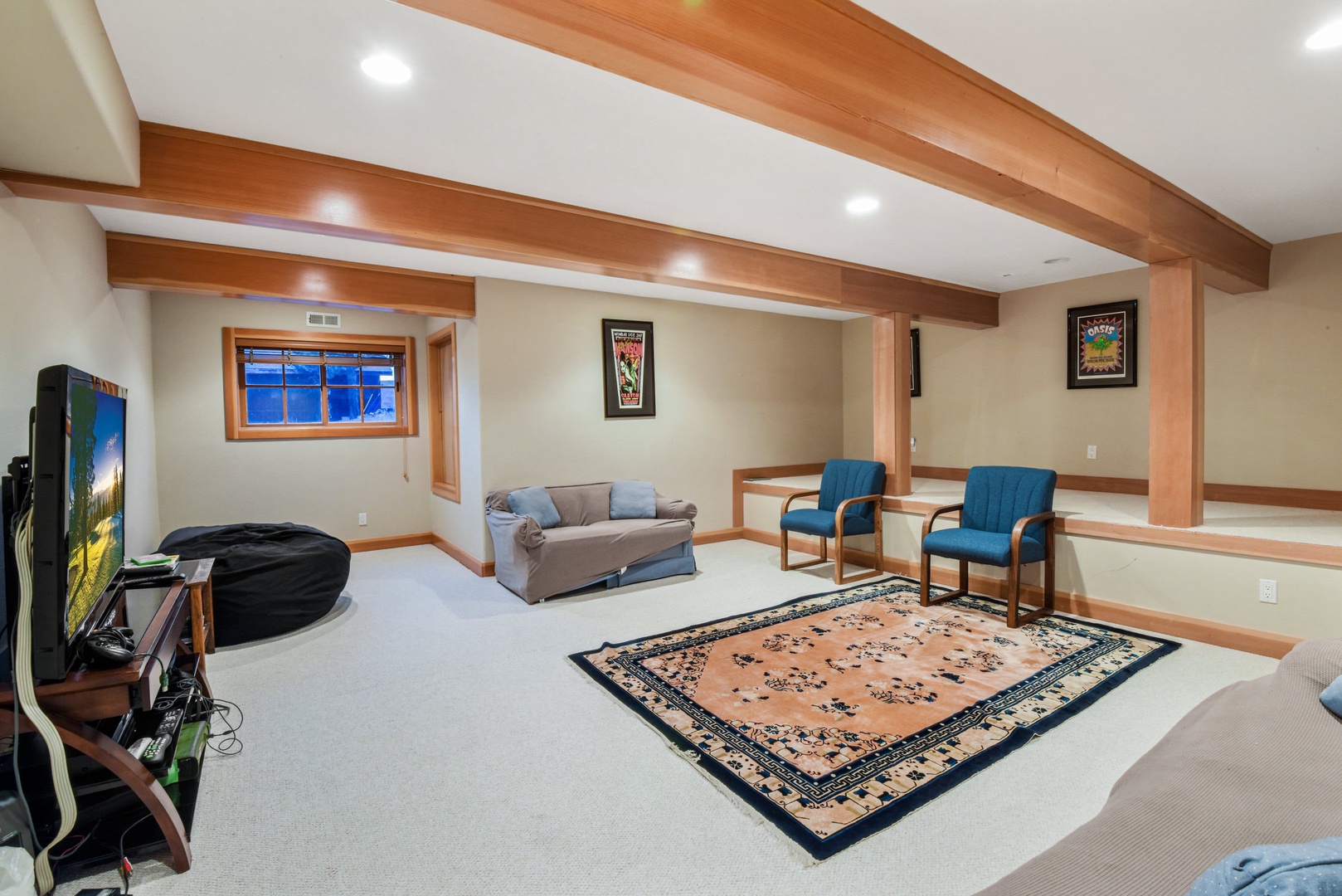 Basement family room with TV, DVD player