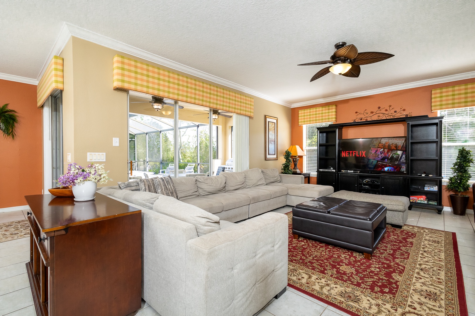 Kick back & enjoy a movie or a show in the family room at the rear of the home