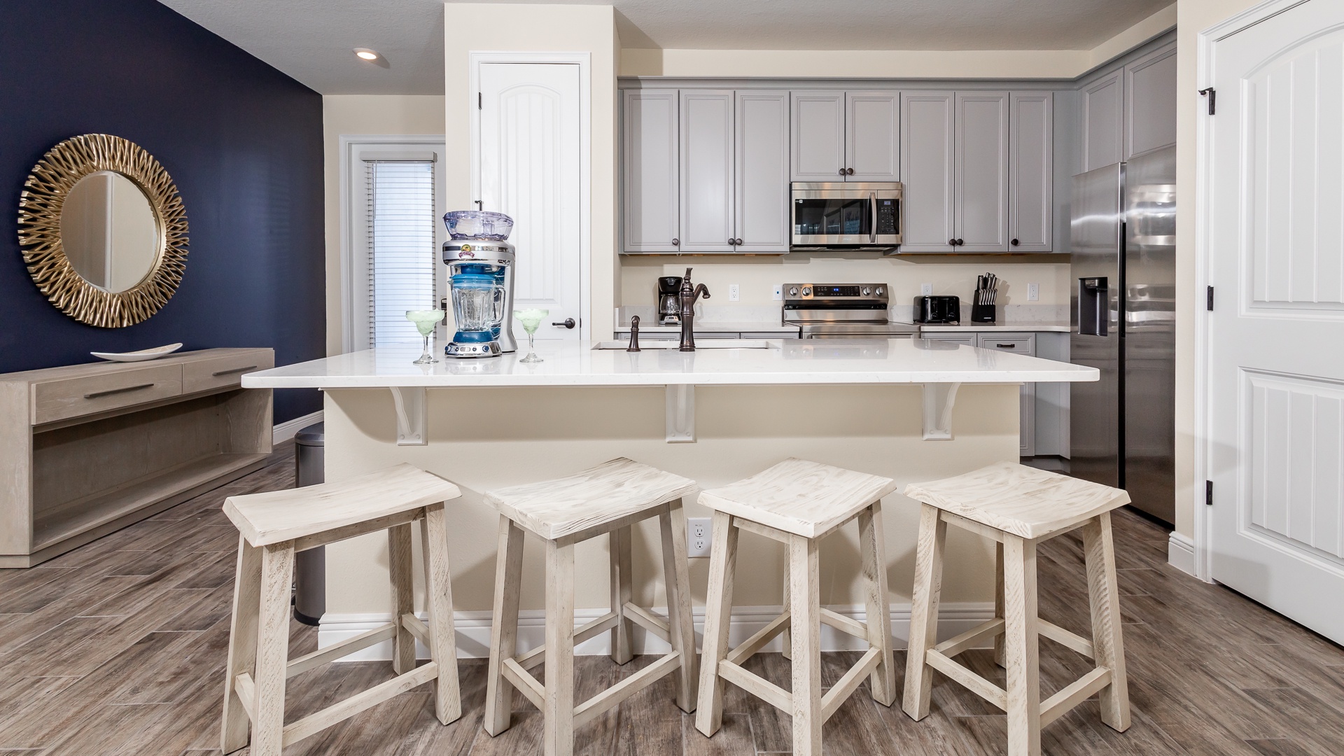 Whip up an adult beverage & enjoy at the kitchen counter, with seating for 4