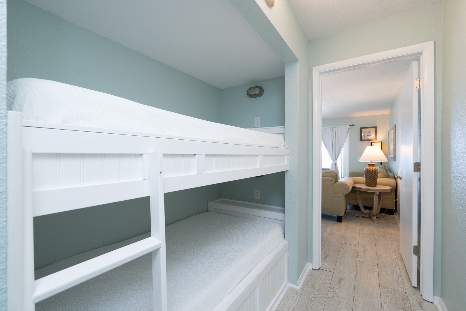 The cozy twin bunks in the alcove are ideal for an afternoon snooze