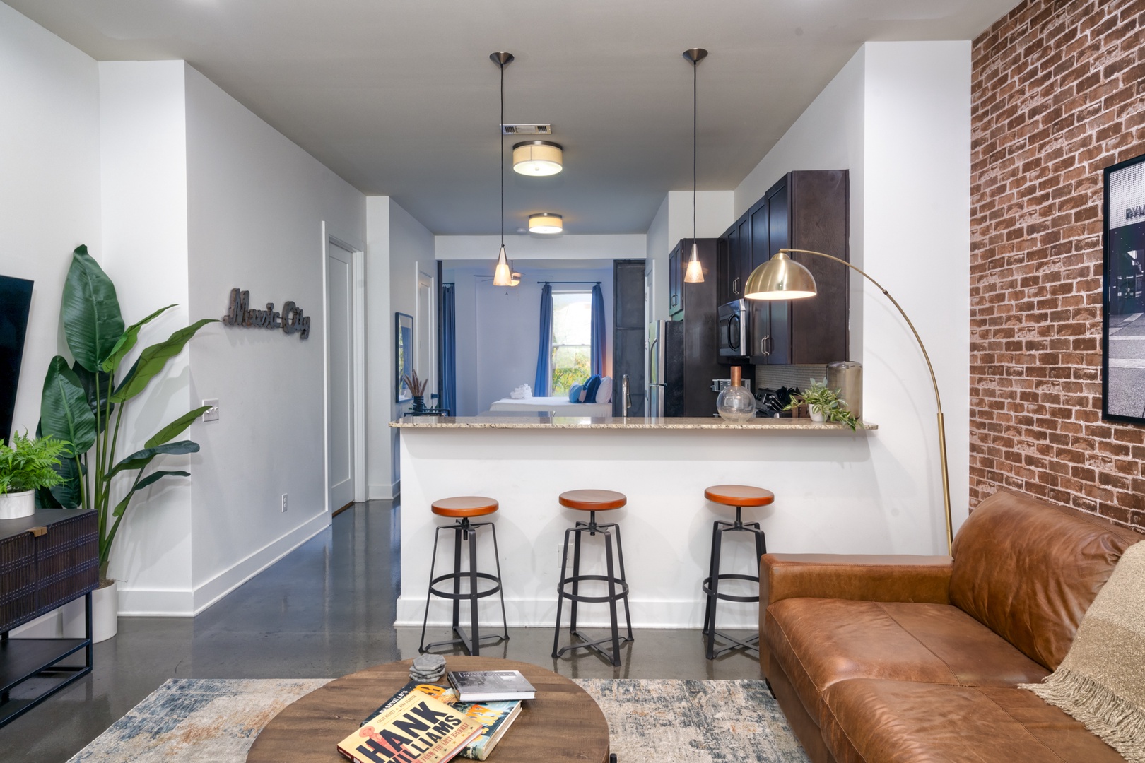 Sip morning coffee or grab a bite at the kitchen counter, with seating for 3