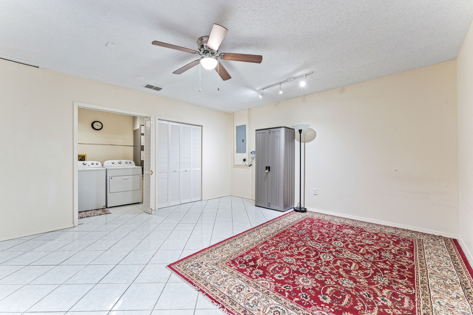 Private laundry is available for your stay, tucked away in the garage