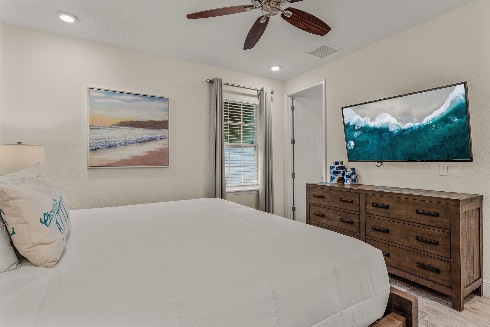 The final 3rd floor suite features a king bed, private ensuite, & Smart TV