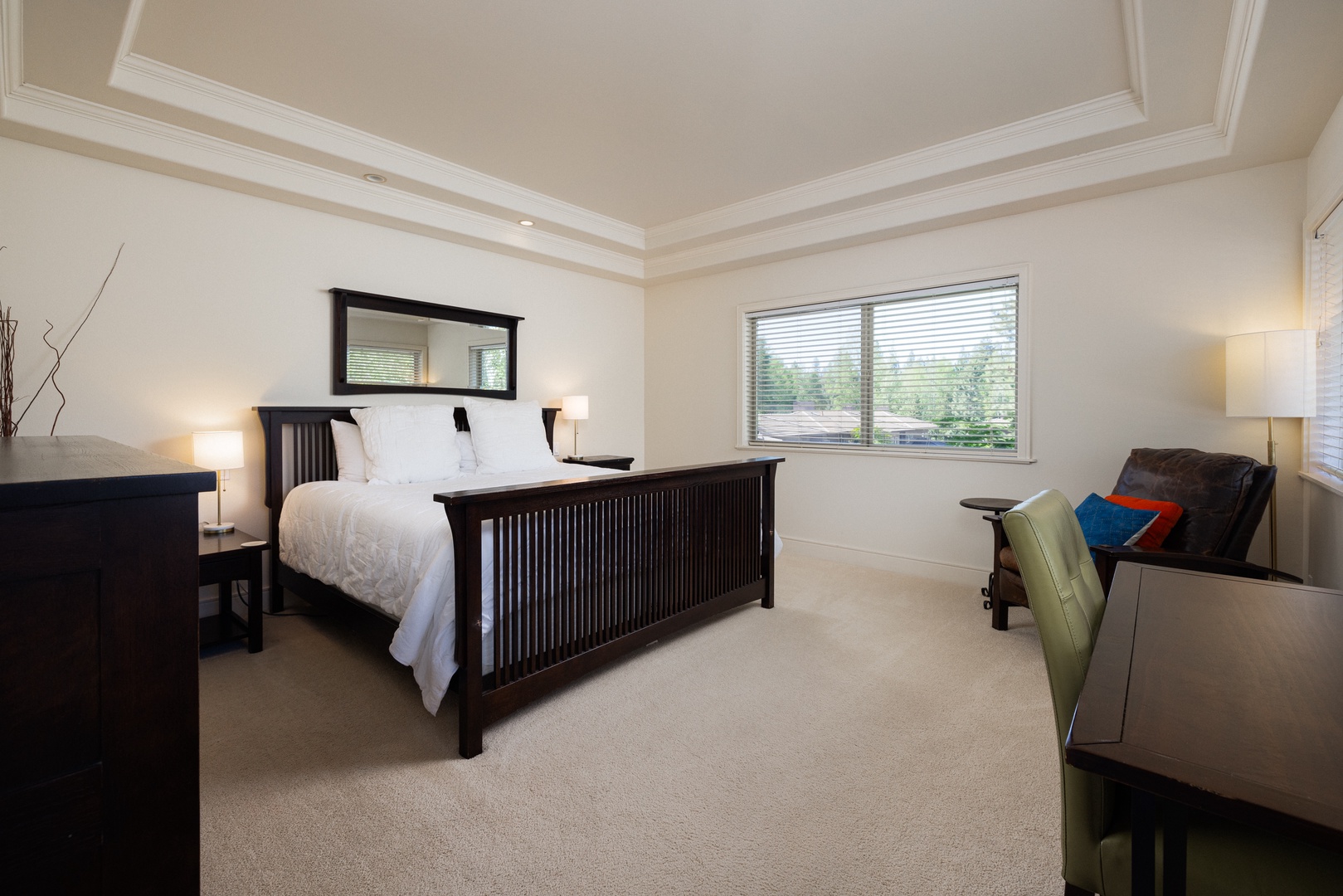 The elegant 2nd-floor king suite boasts a private ensuite & balcony