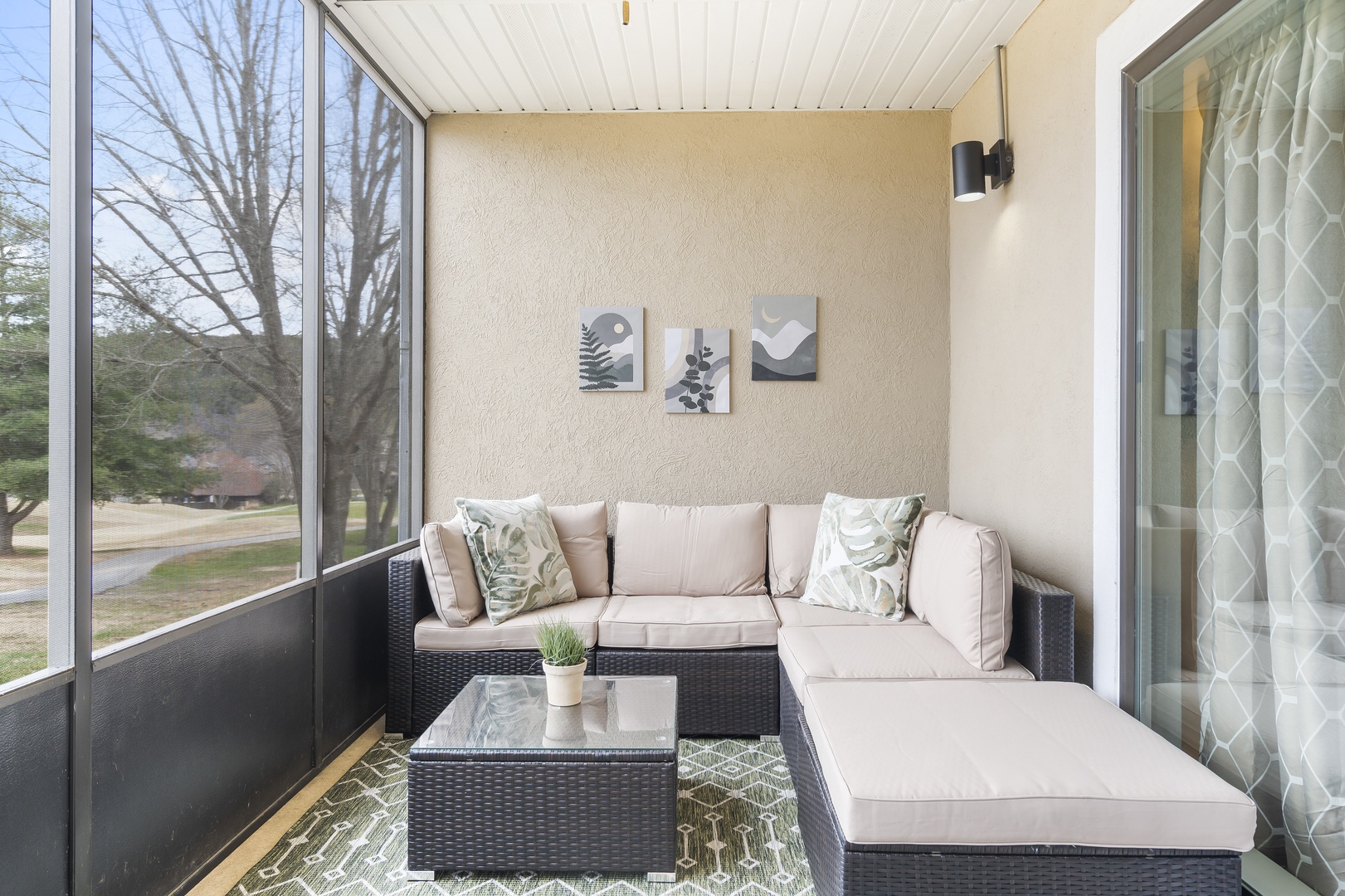 Screened porch with with outdoor seating