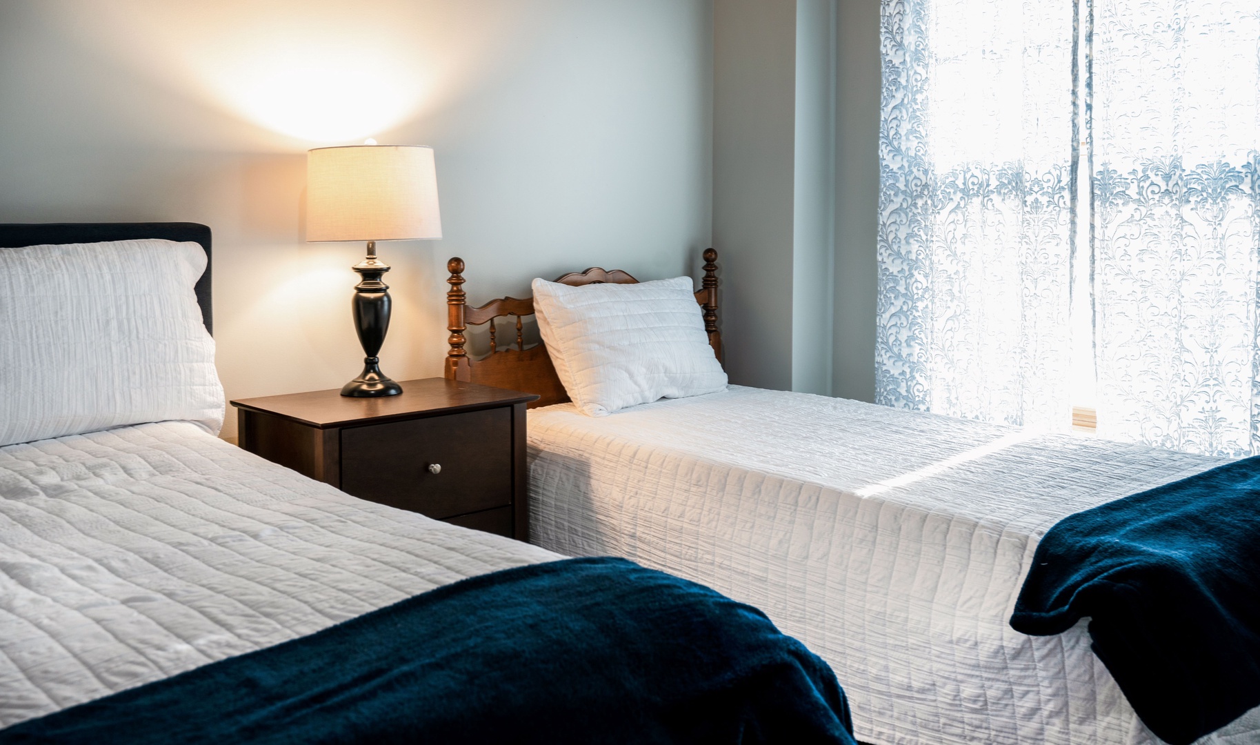 The lower-level bedroom offers a full-sized & twin-sized bed