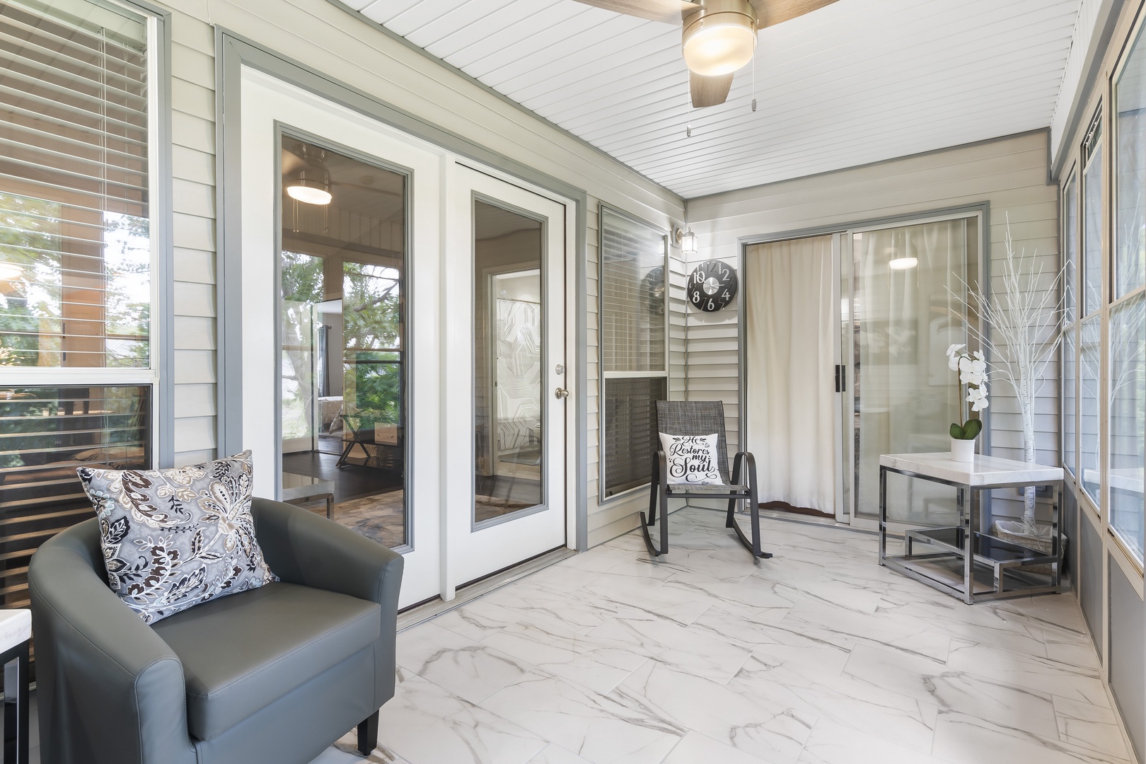 Lounge the day away with views & a great book in the tranquil sunroom