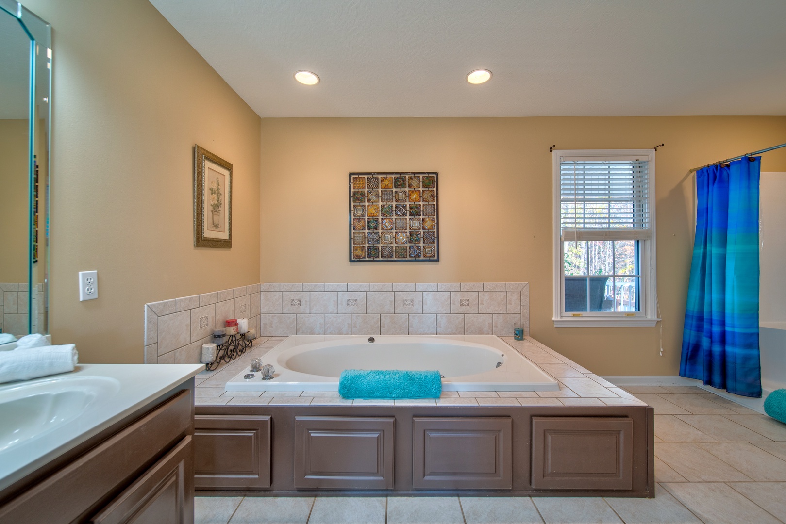 The master ensuite offers a jetted tub, standalone shower, & dual vanities