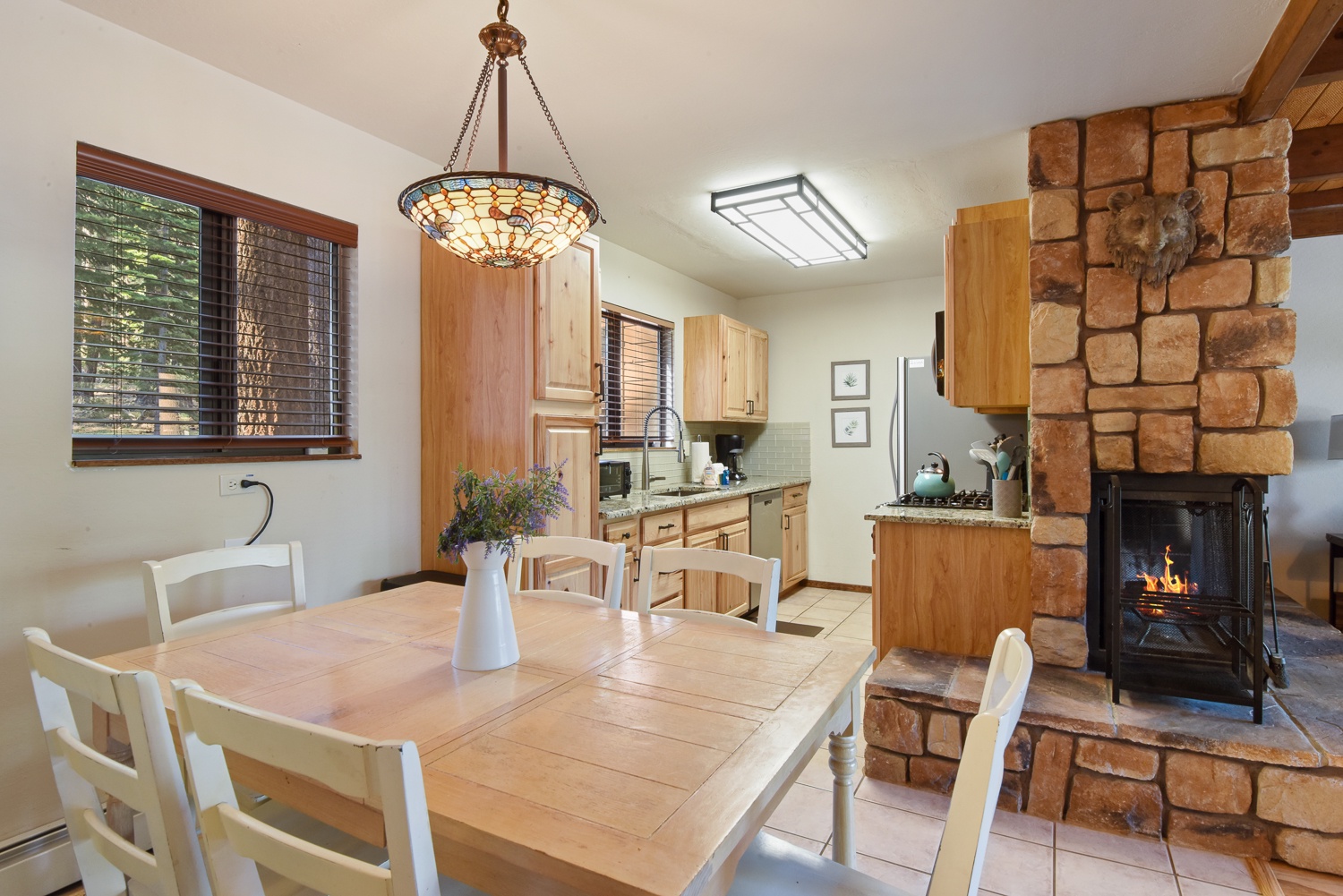 Unit #2: Enjoy meals together at the cozy dining table, with seating for 6
