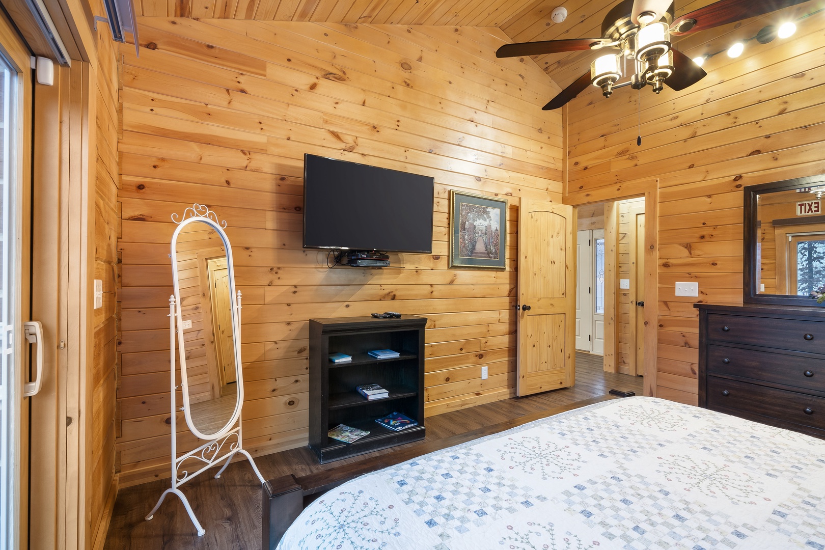 Bedroom 1 with king bed, deck access, Smart TV,and en-suite