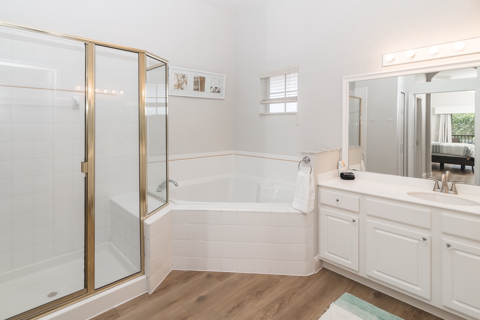 Take a bubble bath in the jacuzzi bathtub or enjoy the standup shower