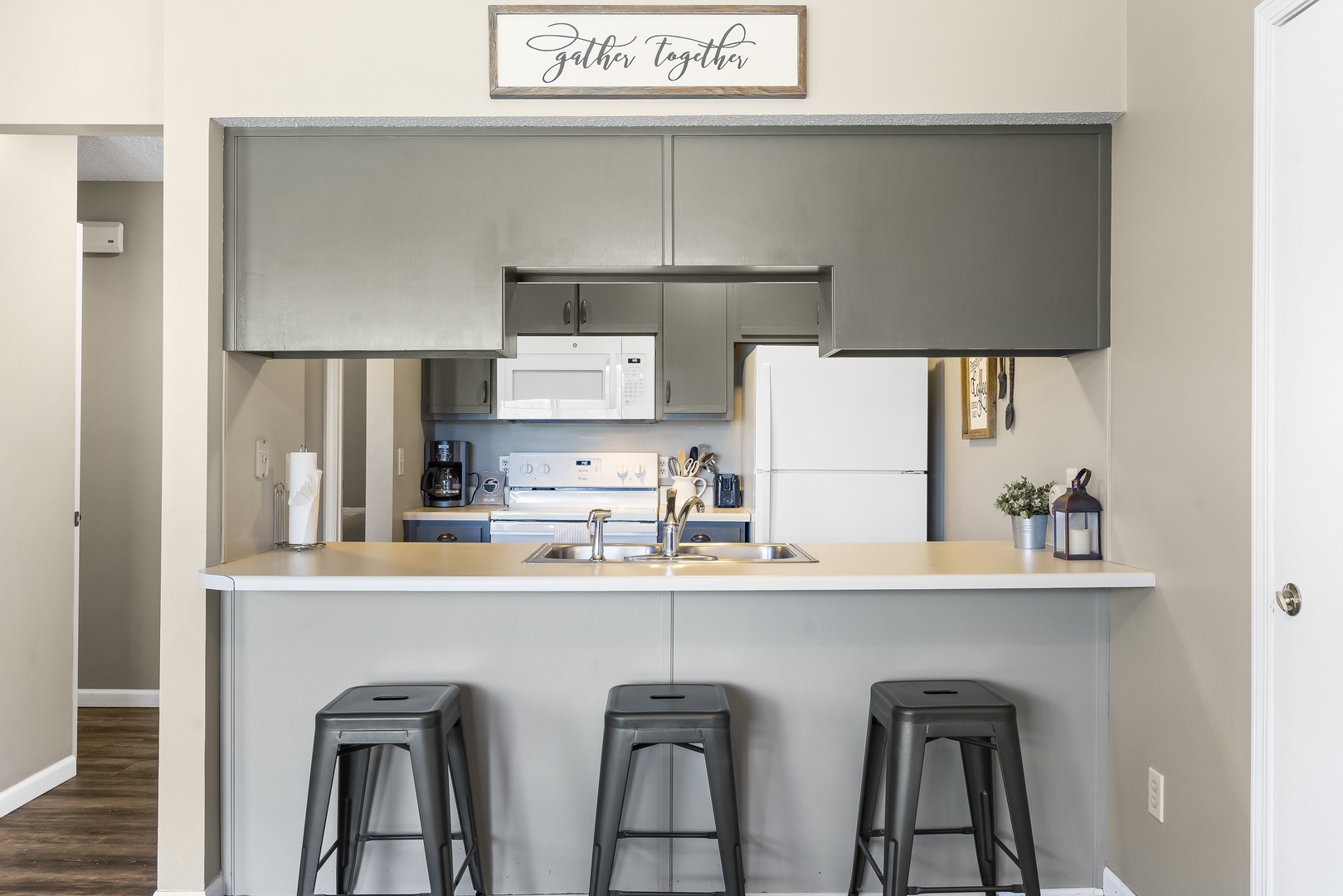 Sip morning coffee or grab a bite at the kitchen counter, with seating for 3