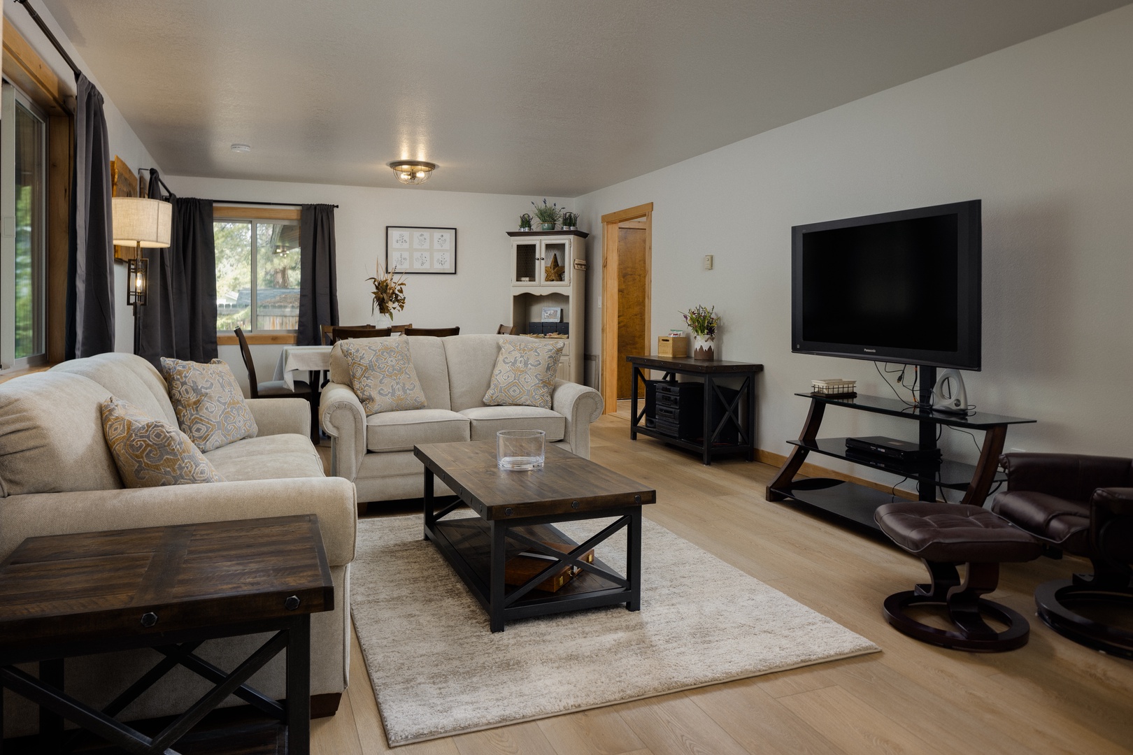 Cozy up in our living room retreat, complete with plush seating and a Smart TV