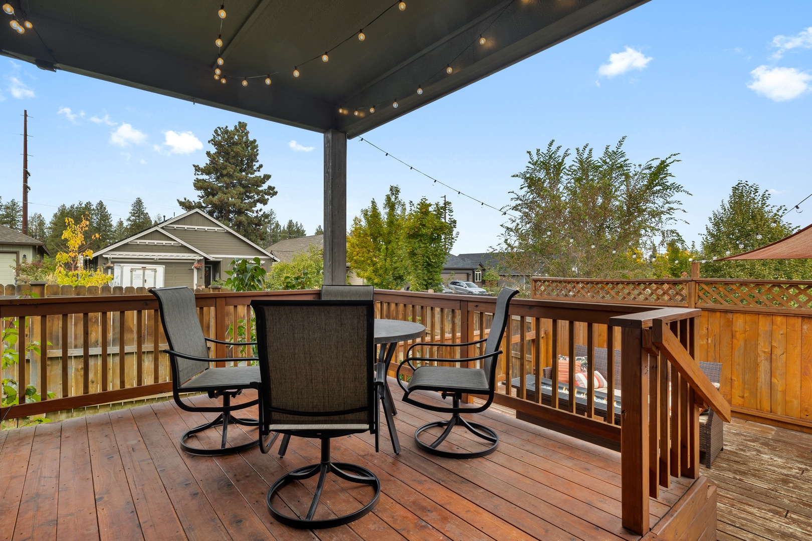 Lounge & dine at the back deck’s outdoor dining set, with seating for 4