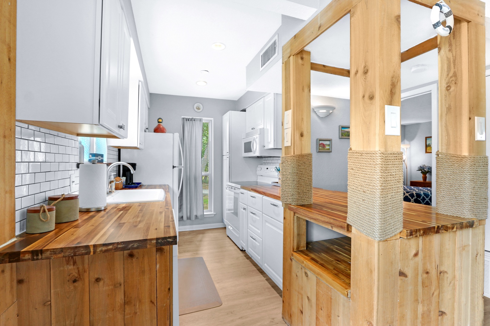 The open, airy kitchen offers ample space & all the comforts of home