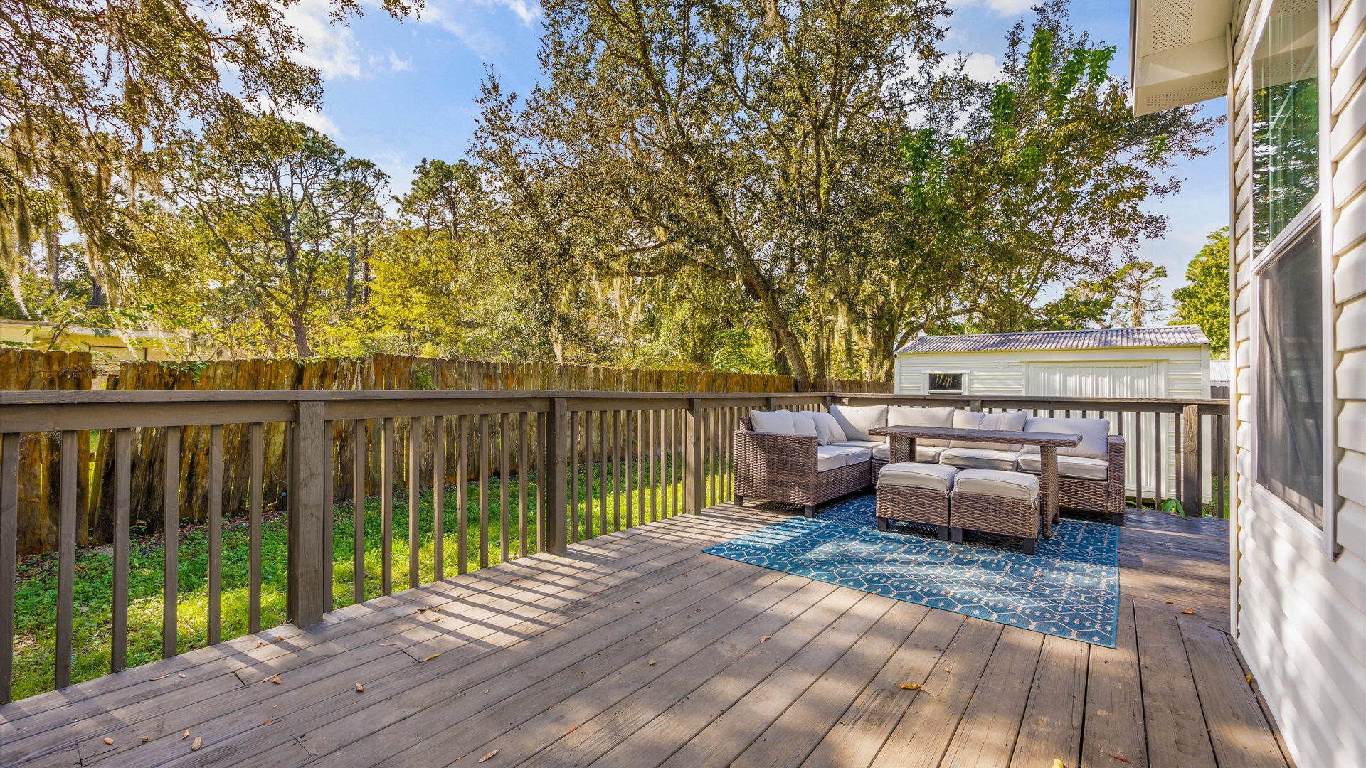 Step out onto the sunny back deck & lounge the day away in the fresh air