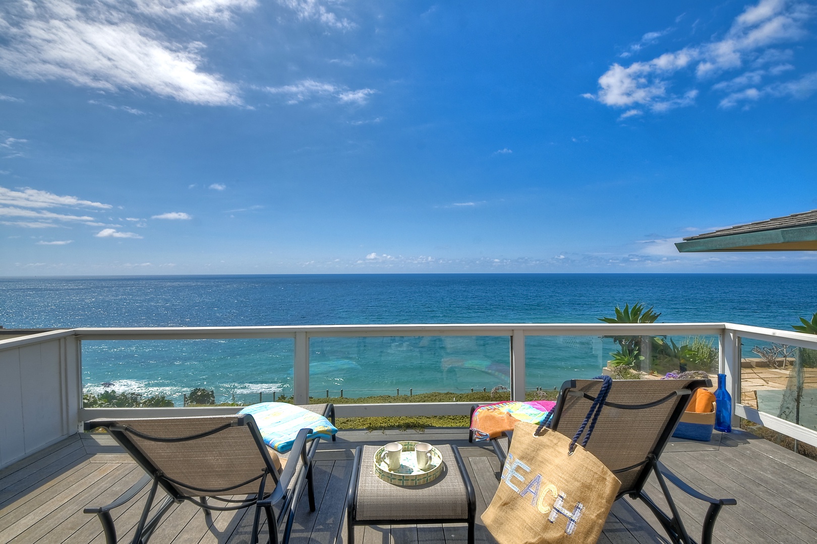 Lounge the day away or dine alfresco with ocean views on the deck