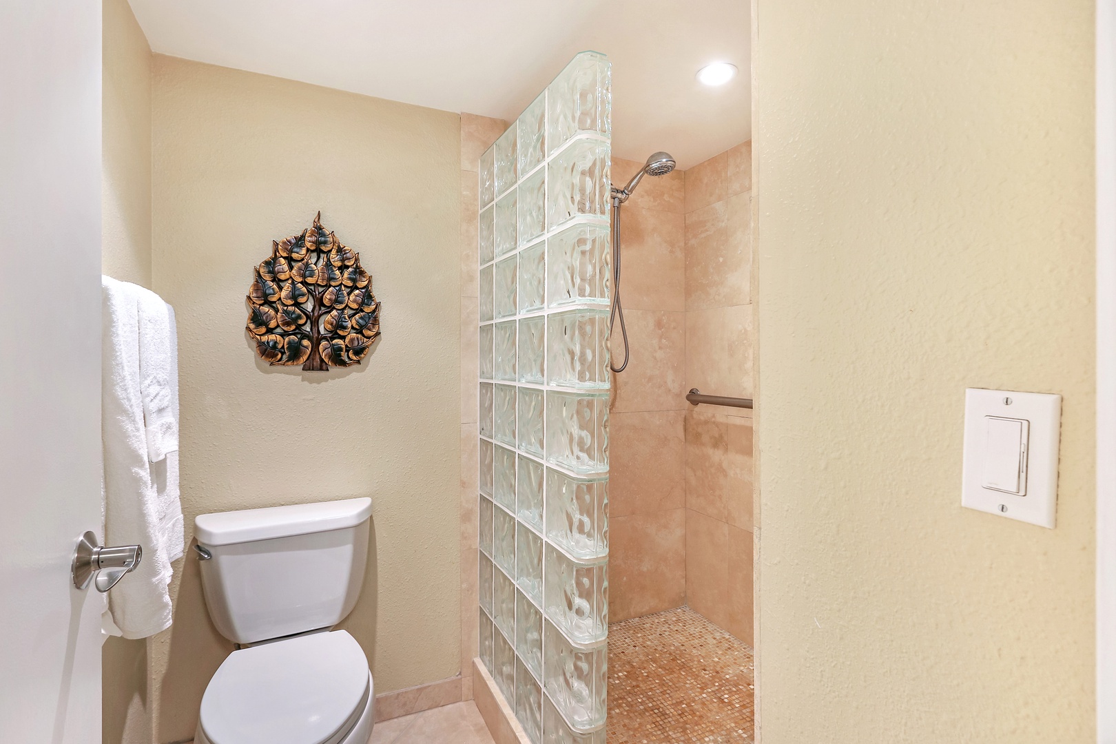 Ensuite bathroom with walk-in shower laundry area