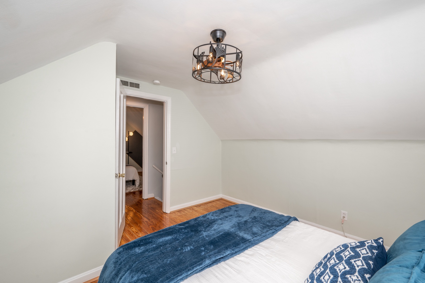 Sneak away to this tranquil 2nd Floor Queen Bedroom with Ceiling Fan