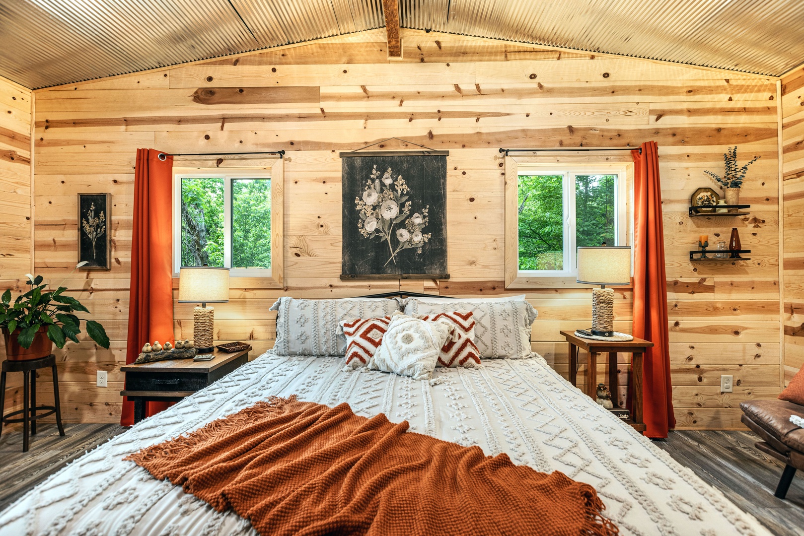 King-sized comfort in a cozy cabin retreat, exuding warm and inviting ambiance