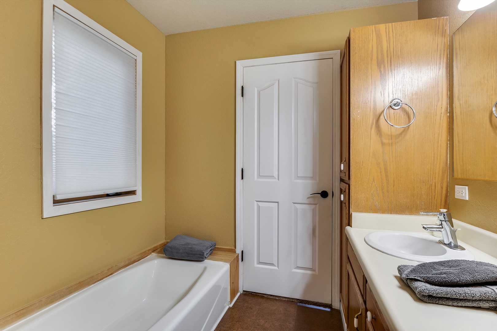 Ensuite bathroom with separate soaking tub and stand-up shower