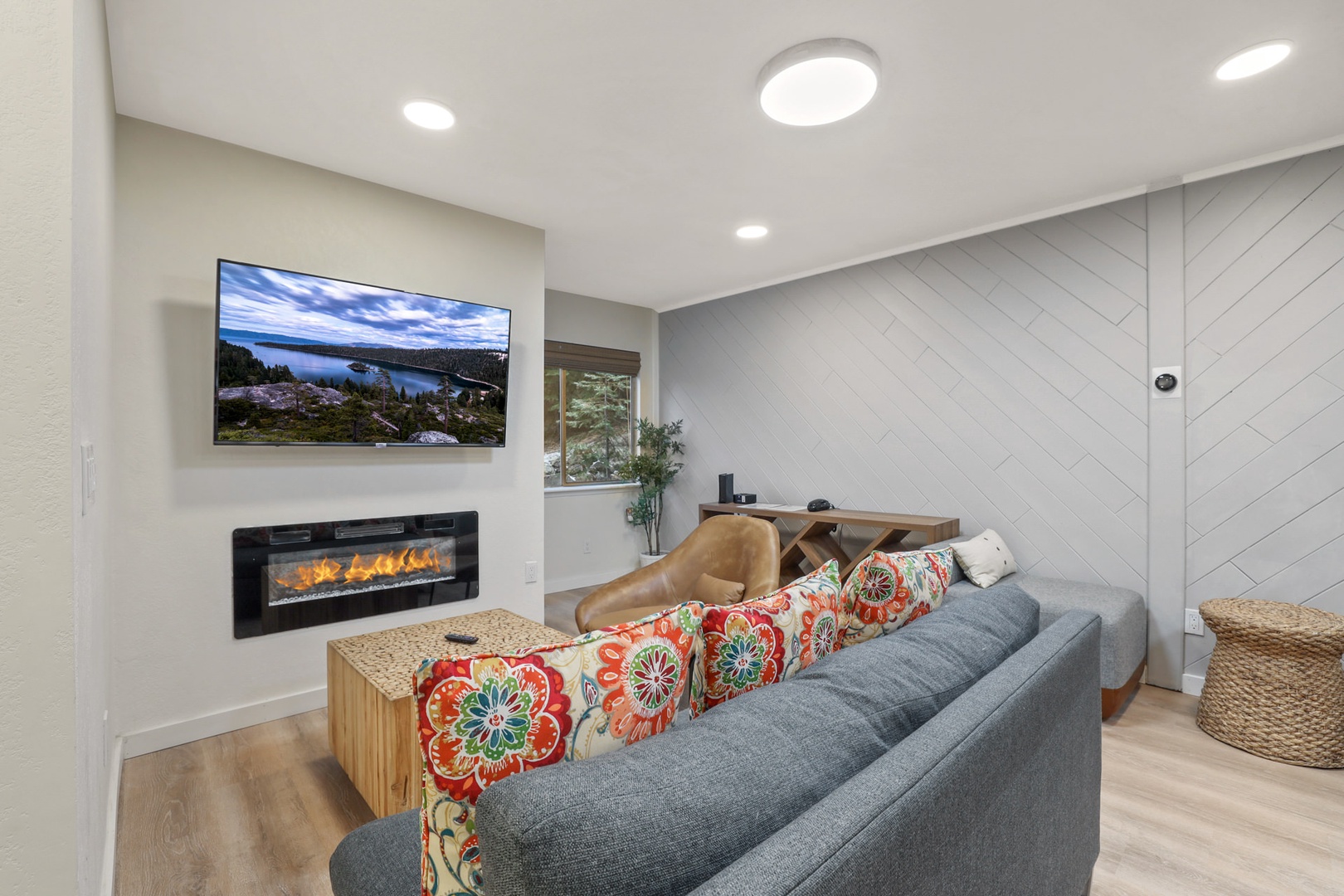 Game room features SmartTV and fireplace