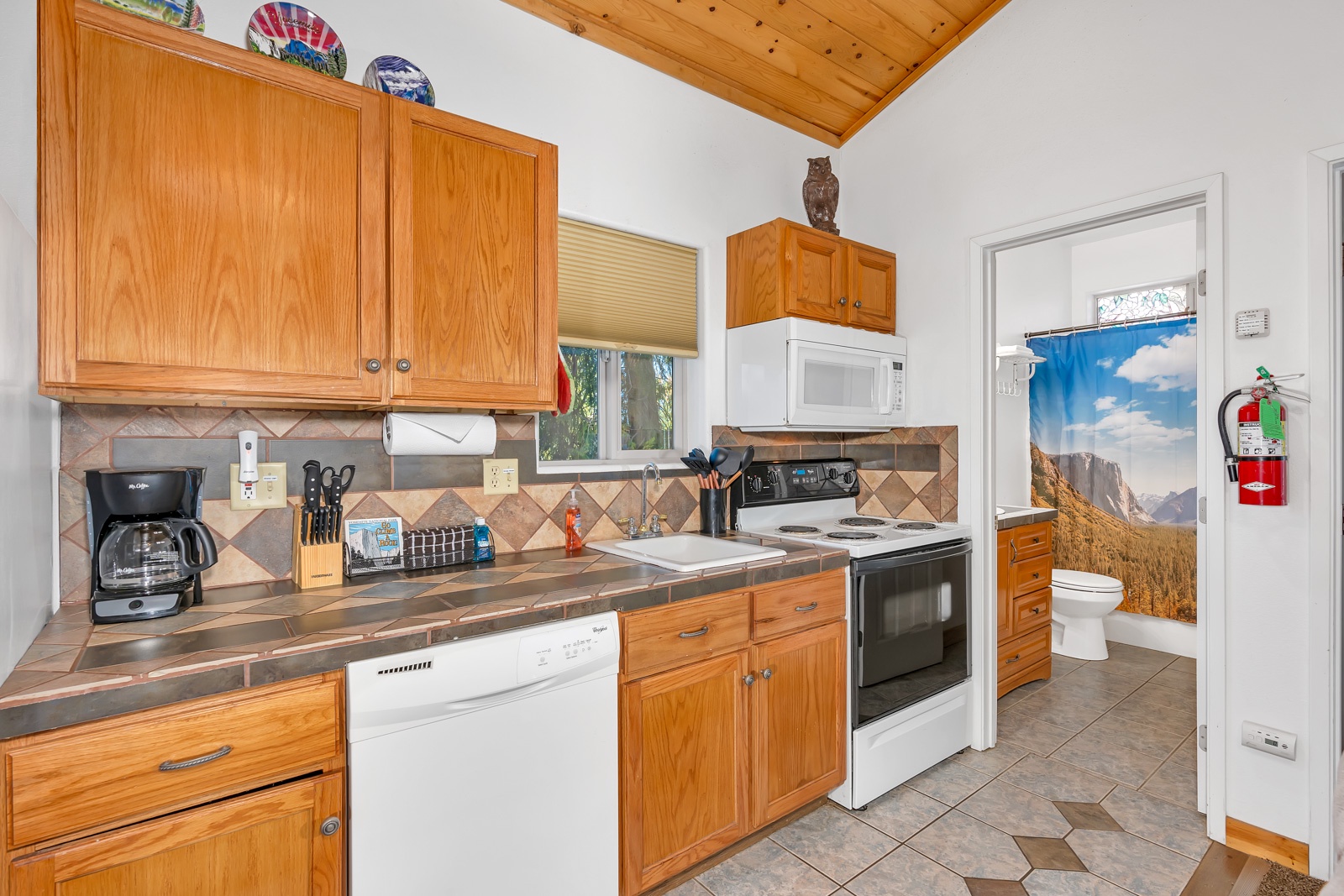 The kitchen offers ample space & all the comforts of home