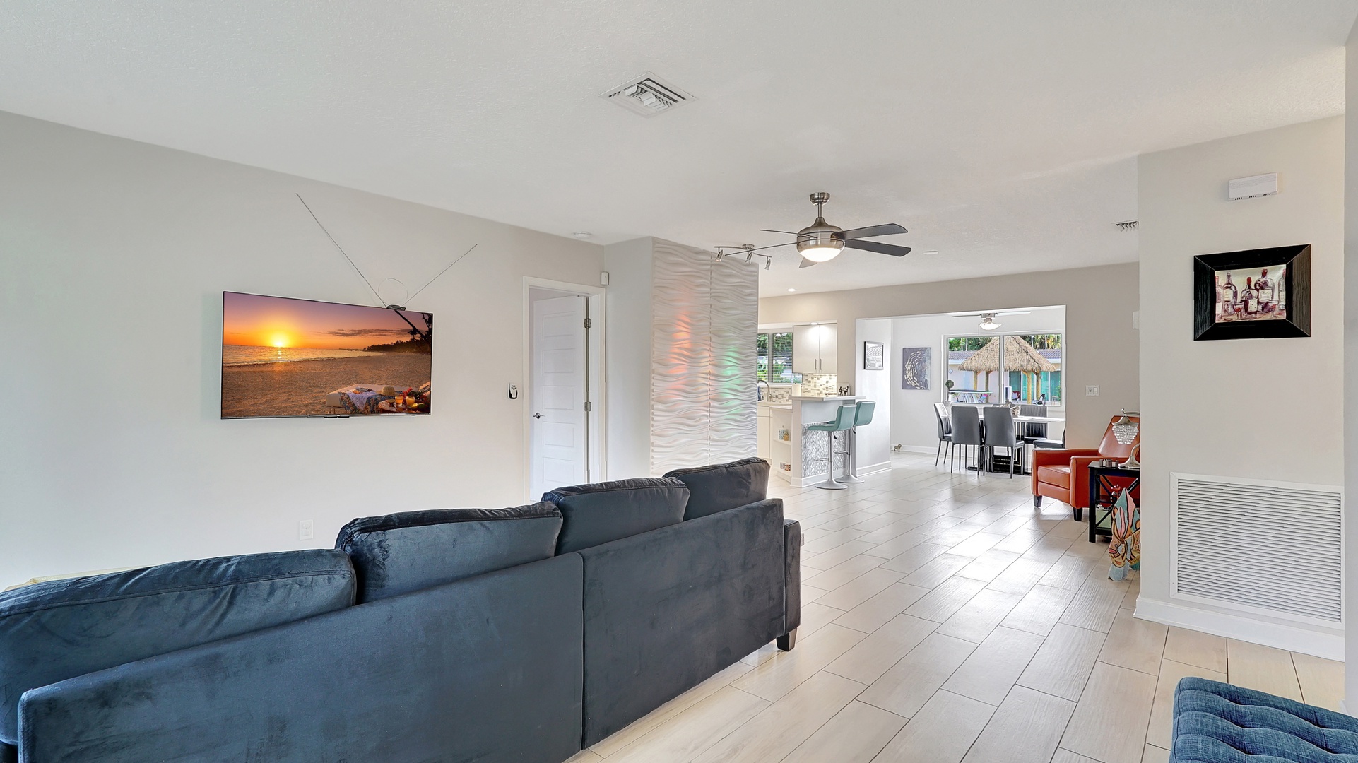 Bright living room with Smart TV, and cozy seating