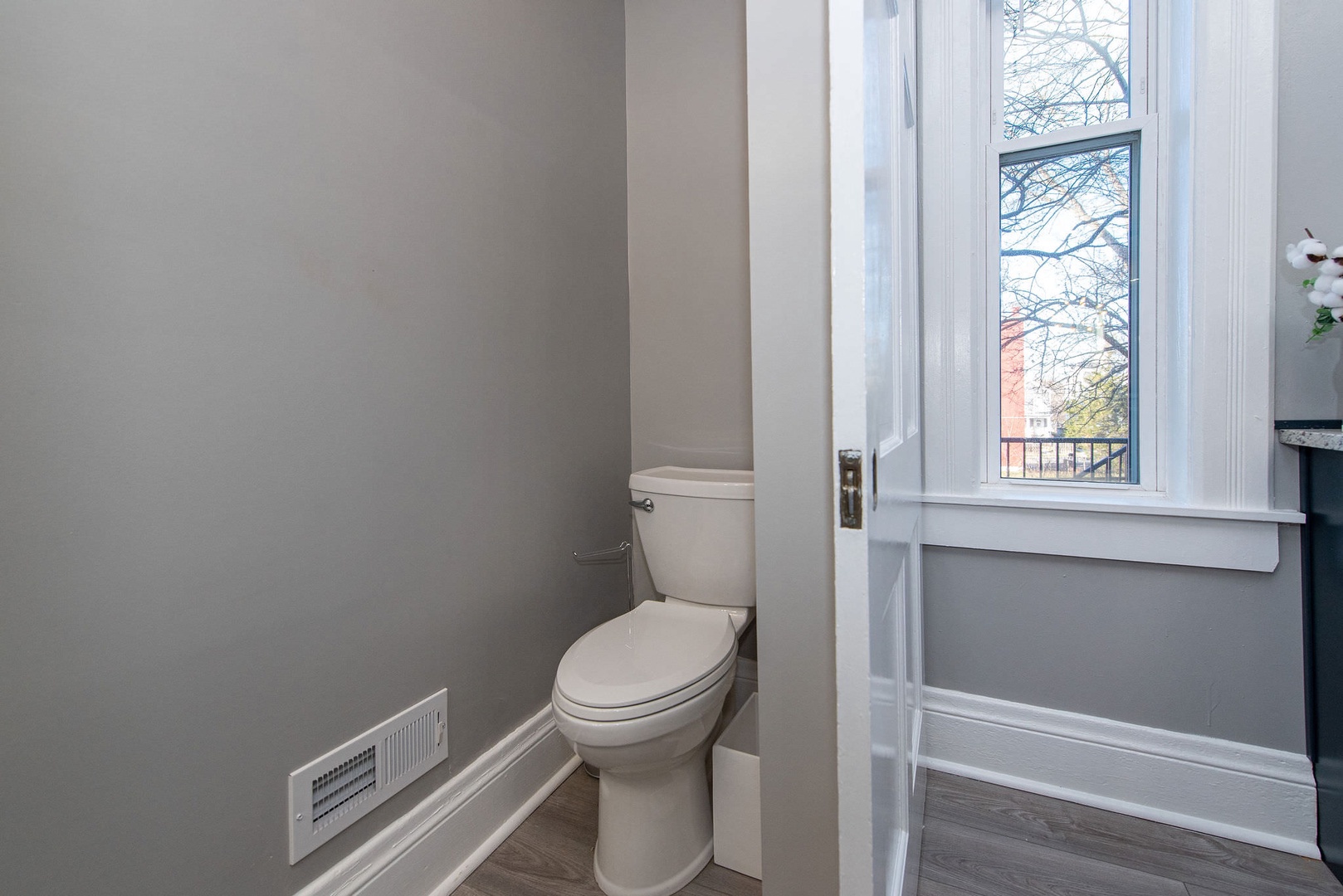 Suite 2 – A convenient half bath is tucked away on the main level