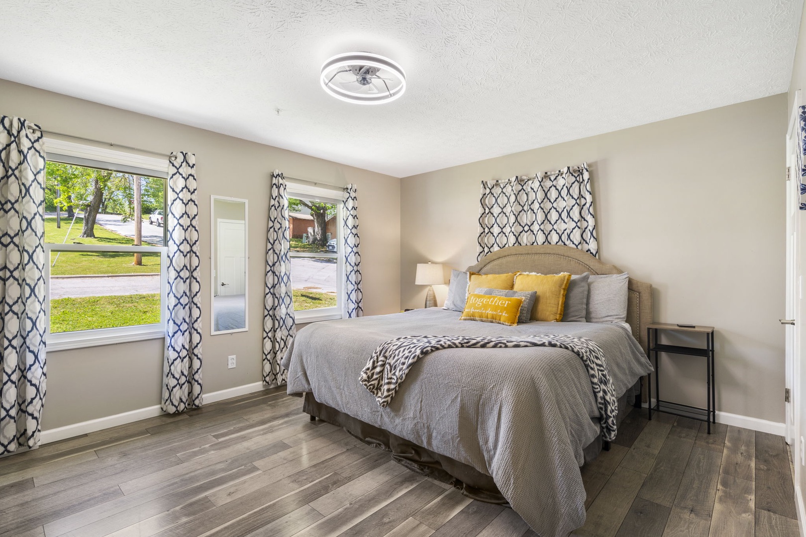 The spacious king suite includes a private en suite, Smart TV & ceiling fan
