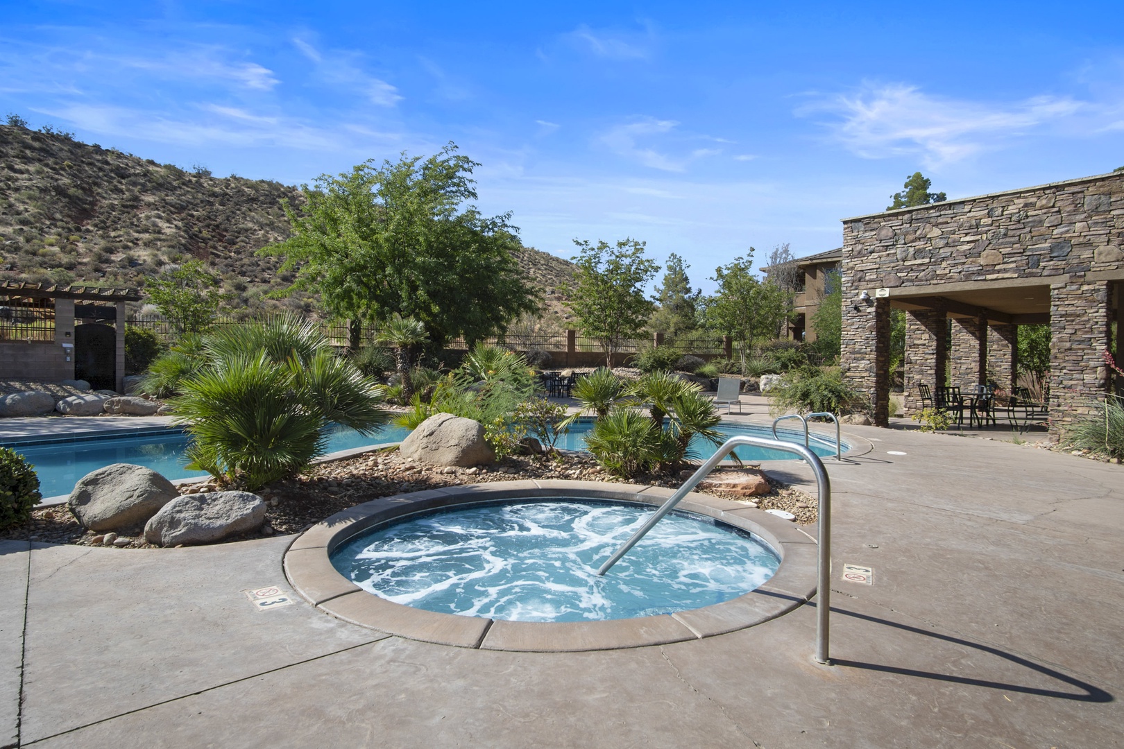 Outdoor communal pool with hot tub