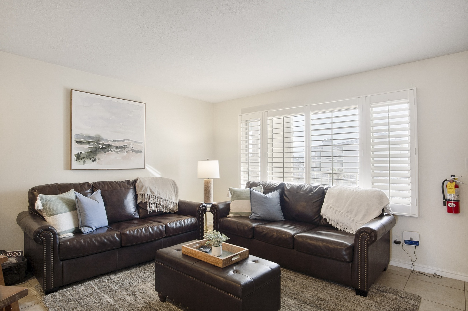 Cozy and spacious living area with TV