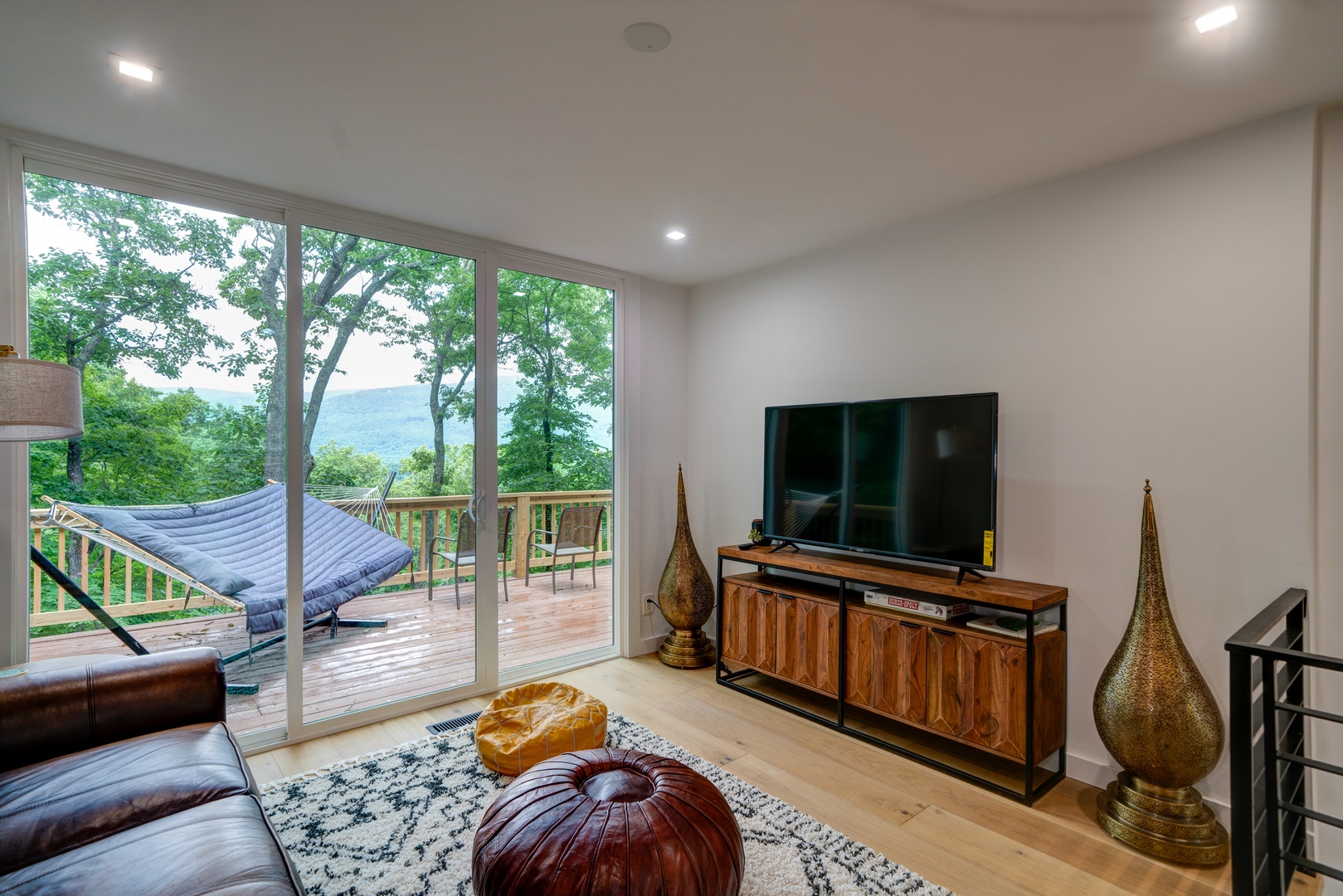 Curl up in the living room & stream your favorites with mountain views