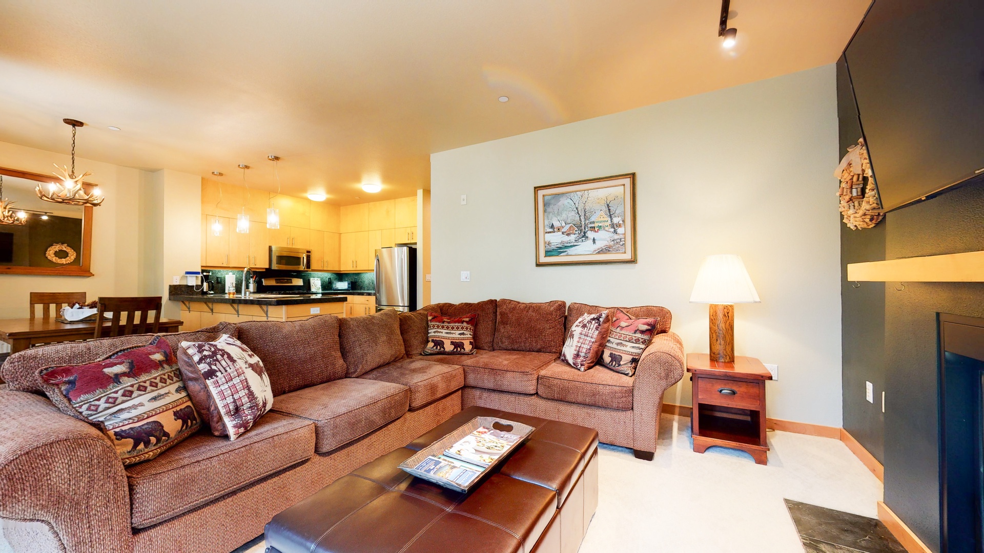 Living room with sofa sleeper, Smart TV, gas fireplace