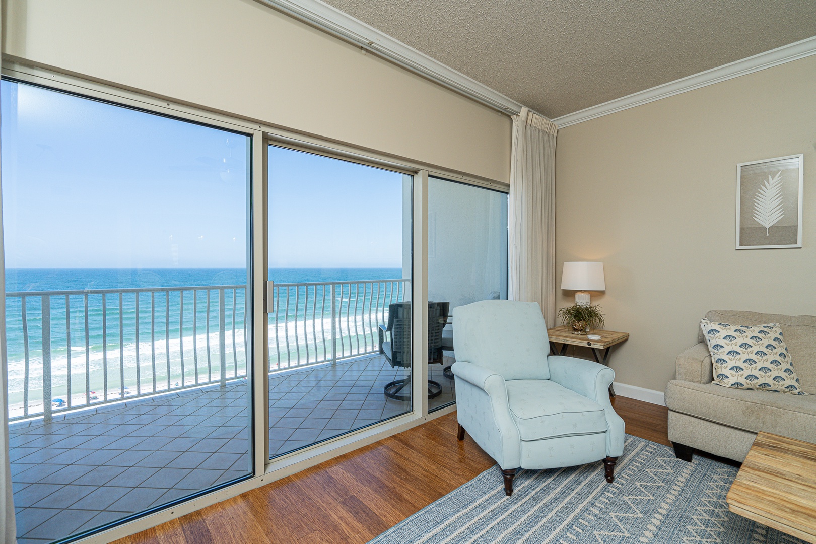 Curl up in the coastal living room & enjoy the view or a movie night at home