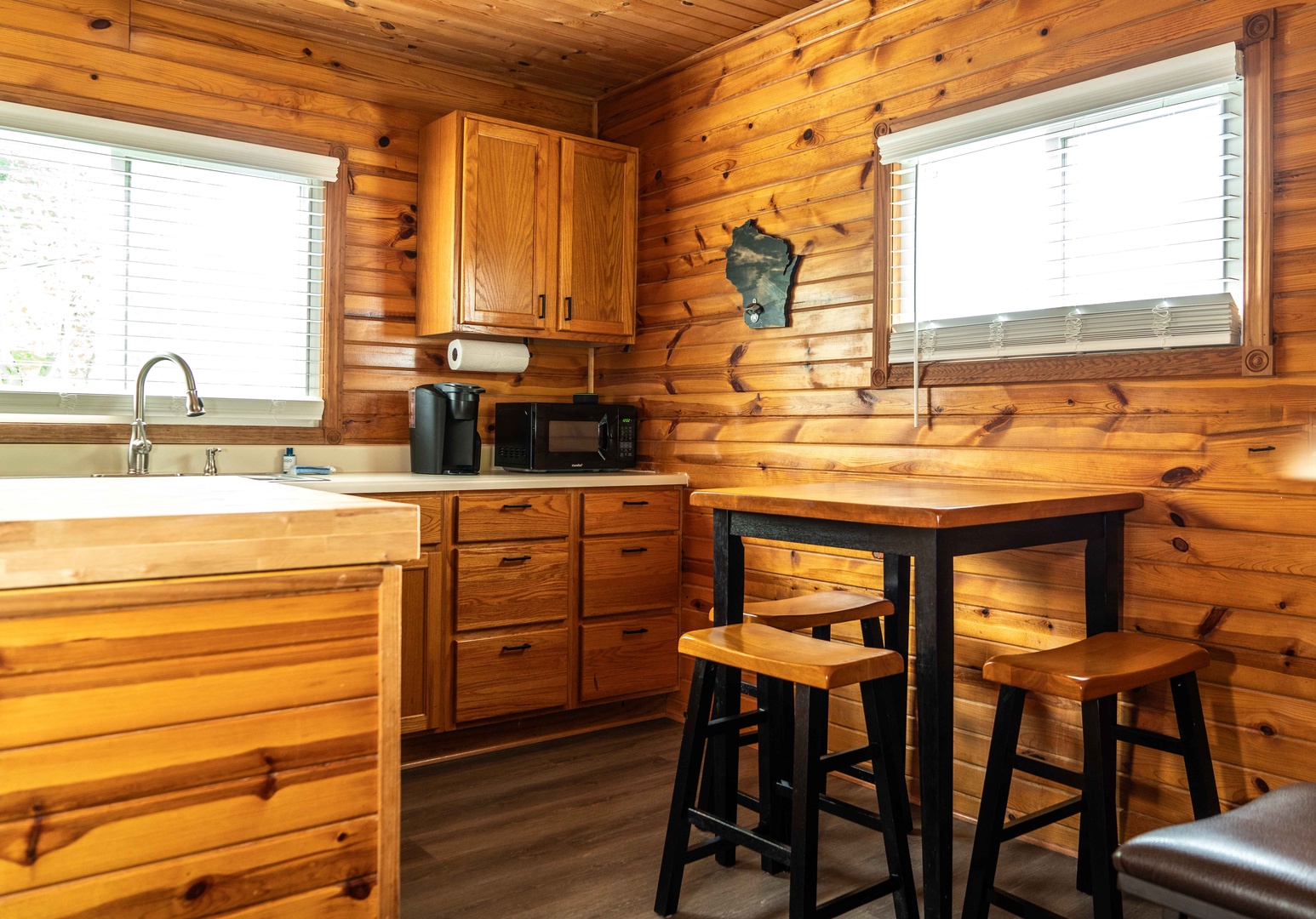 High-top seating for the whole crew is available in the inviting eat-in kitchen