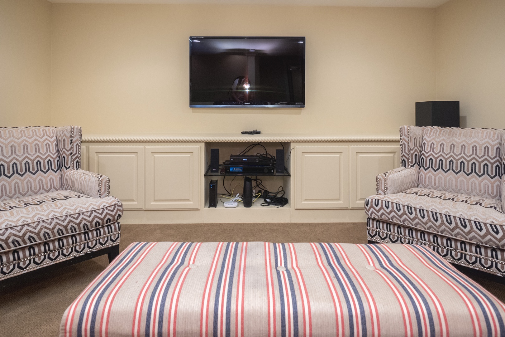 The lower-level family room is ideal for relaxing movie nights